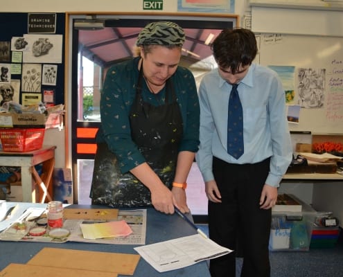 Art teacher and student