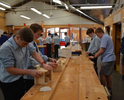 Students doing wood work